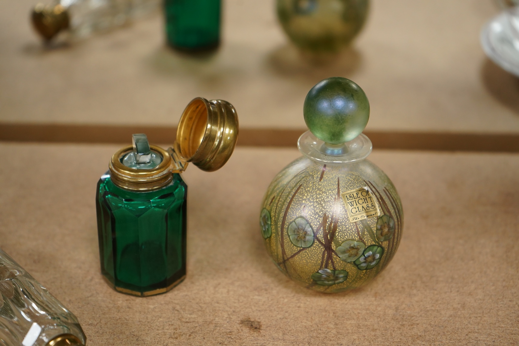 A 19th century double ended scent bottle, a green glass example and an Isle of Wight glass example, largest 9.5cm high